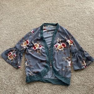 Gray, flowered kimono with lace trim and cut out sleeve details